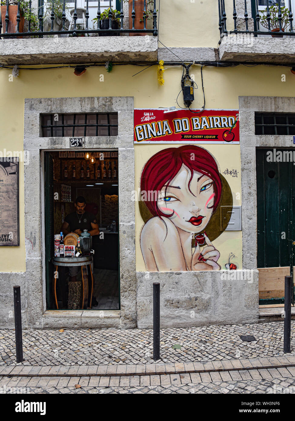 Lisbon, Portugal - July 27, 2019: Advertisement for Ginja, a traditional portuguese Cherry Brandy Stock Photo