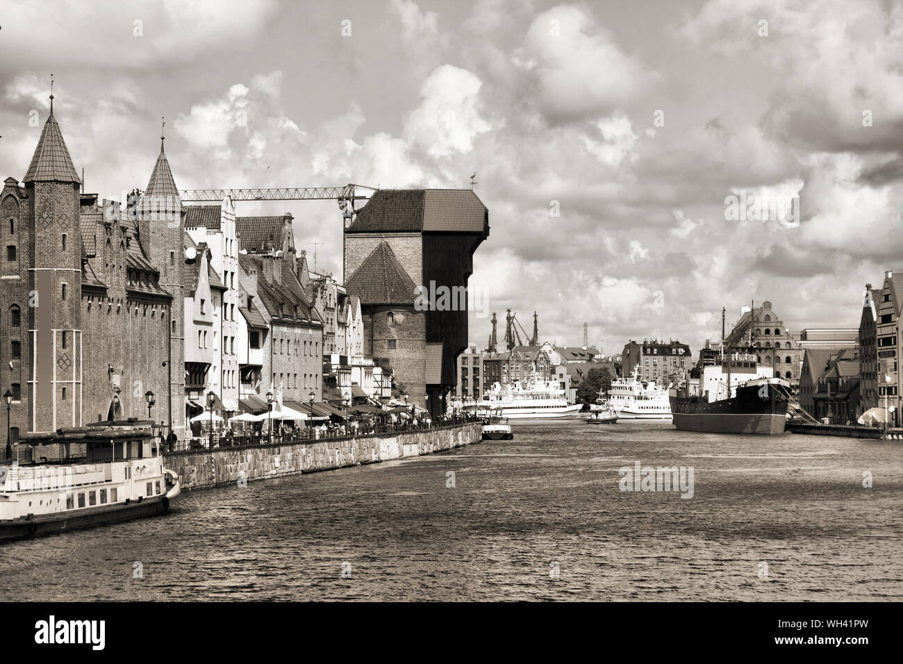 Poland - Gdansk city (also know nas Danzig) in Pomerania region. Old town view with Motlawa river and famous Crane. Stock Photo