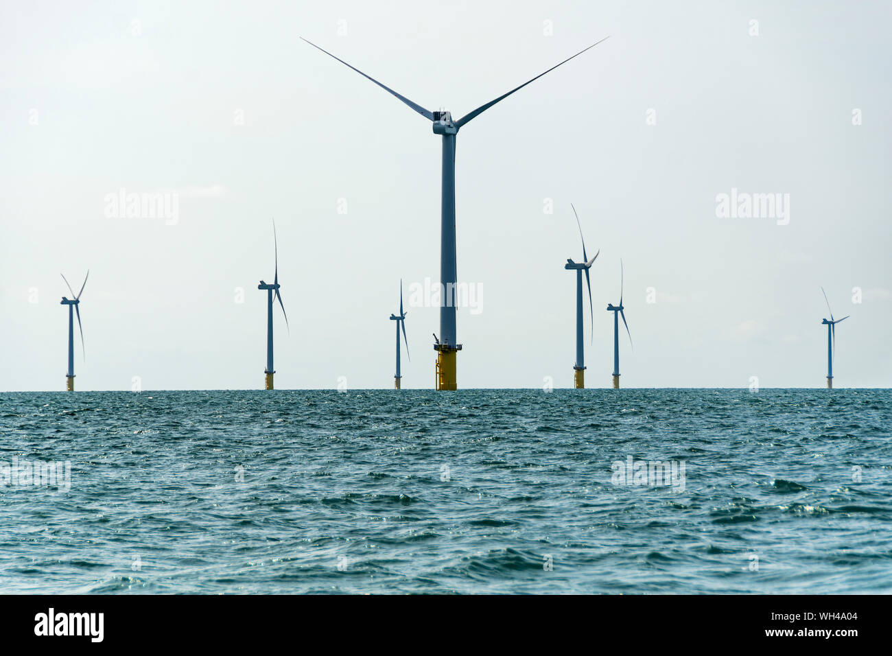 Renewable energy at wind farm off coast of England Stock Photo