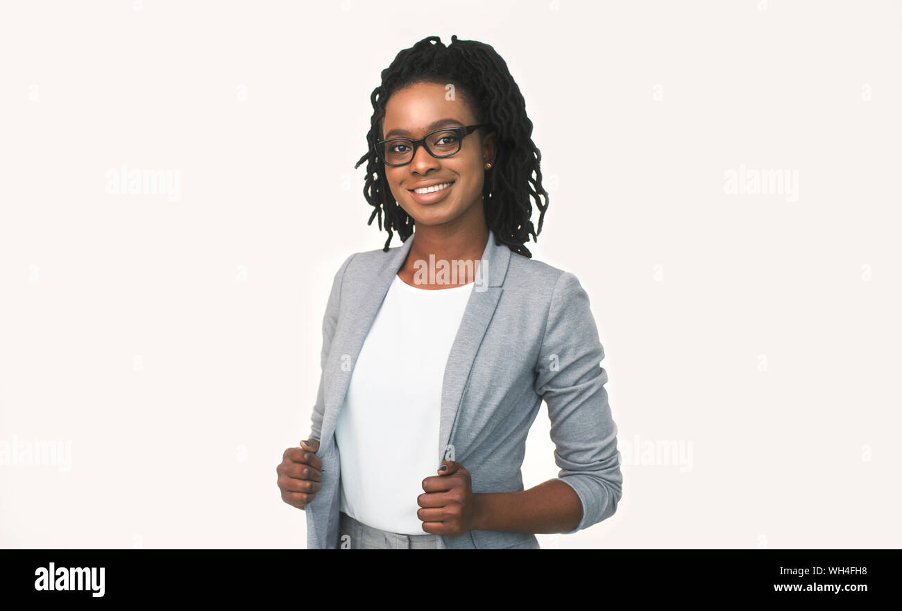 Smiling African American Teacher Woman Posing At Camera, White Background Stock Photo