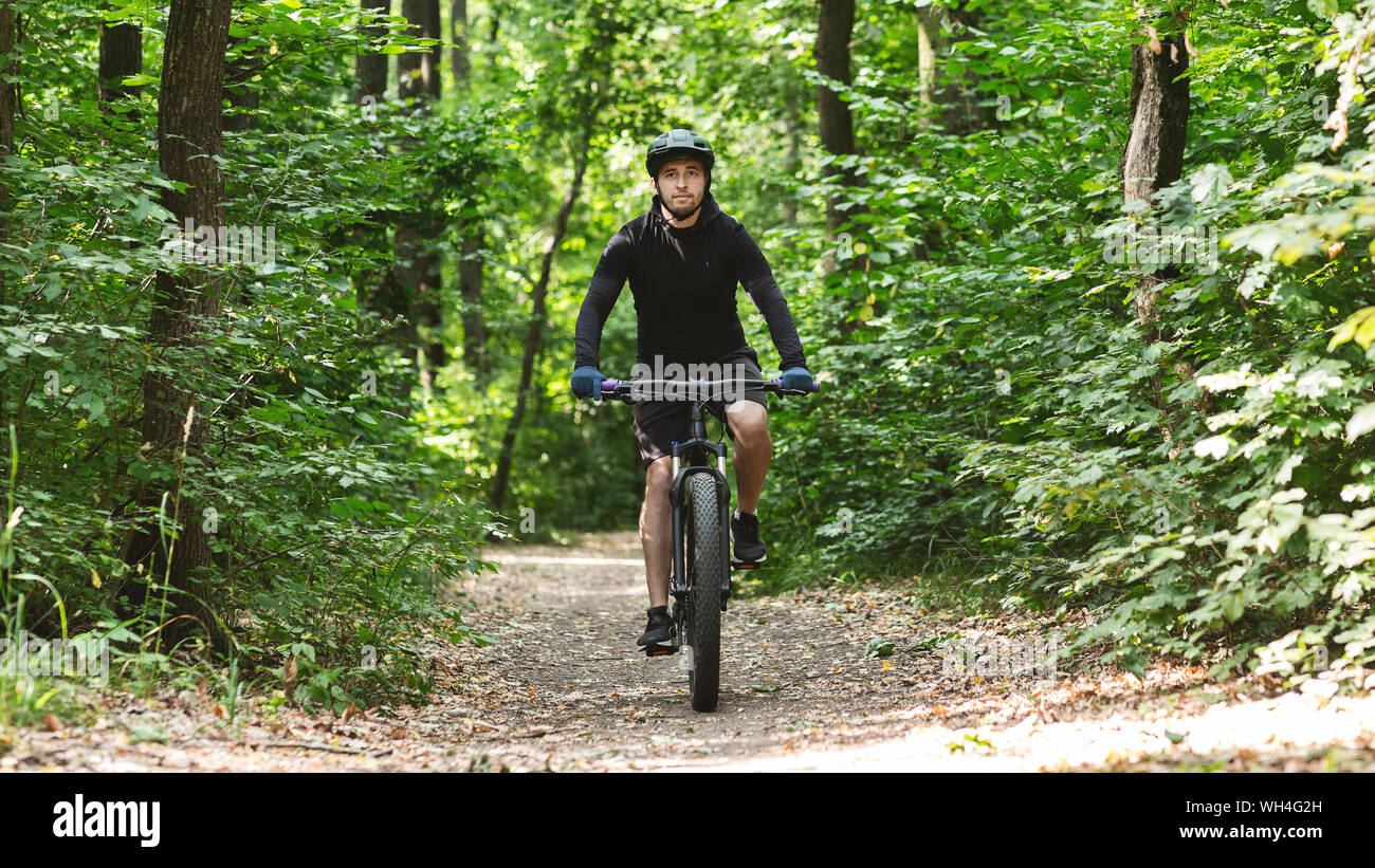 Proffesional cyclist doing his daily ride open air Stock Photo