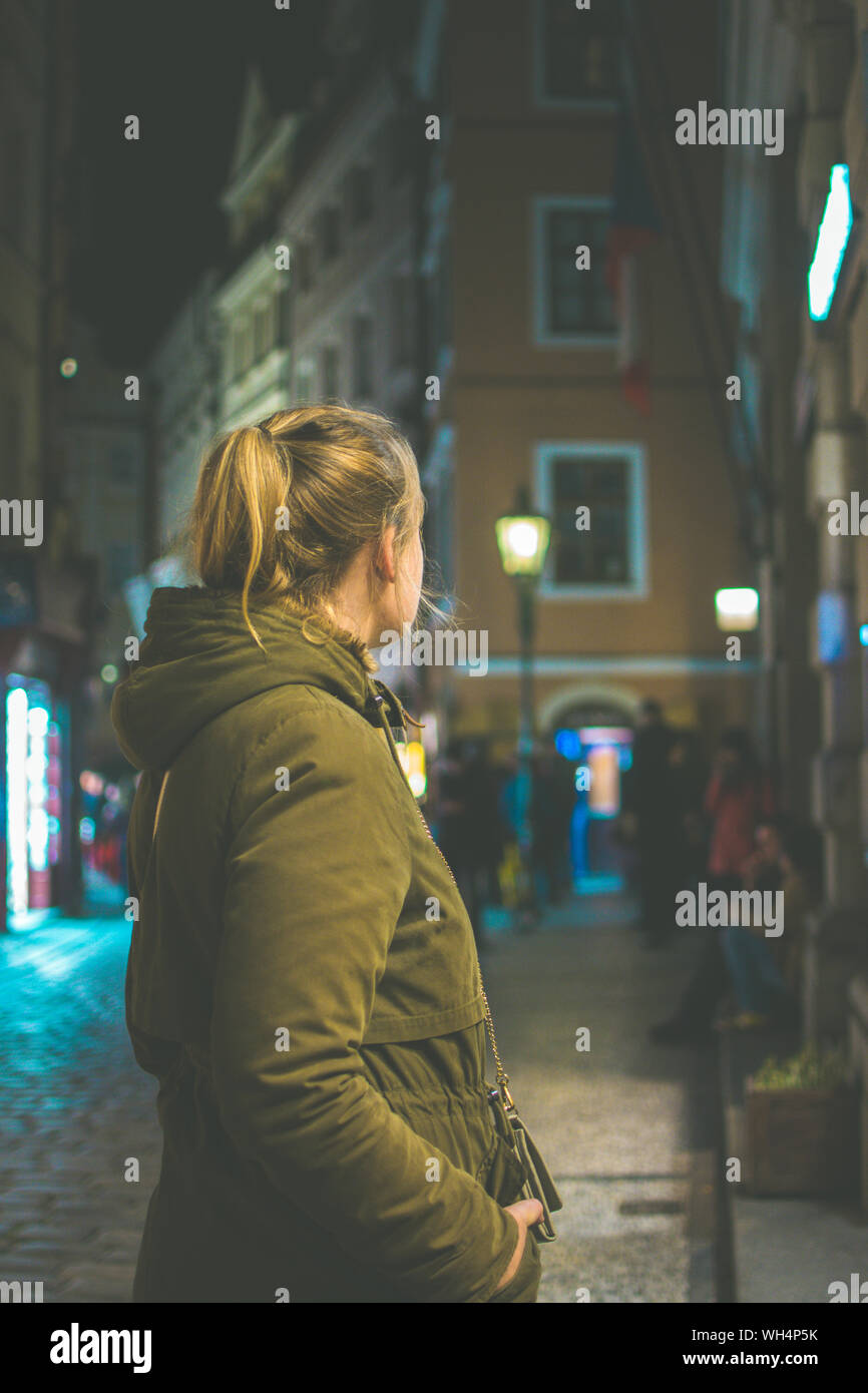 Woman standing cold on street hi-res stock photography and images - Alamy