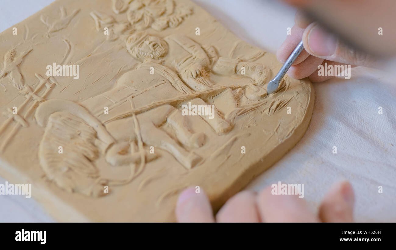 Potter making clay stamp picture Stock Photo Alamy