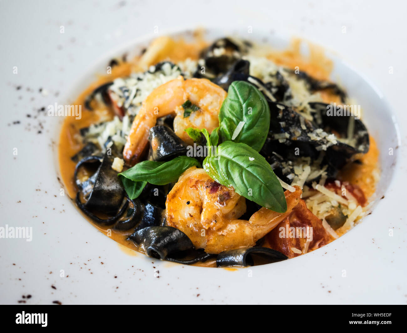 High Angle View Of Fettuccine With Shrimps Served In Plate On Table Stock Photo