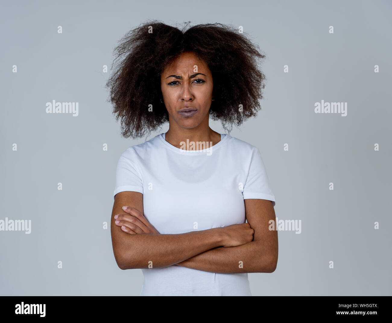 Portrait of attractive frustrated african american woman with angry and  stressed face. Looking mad and crazy shouting and making furious gestures.  Fac Stock Photo - Alamy
