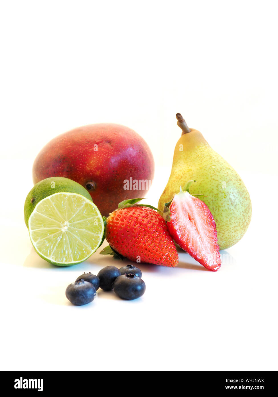 Close-up Of Fruits On White Background Stock Photo