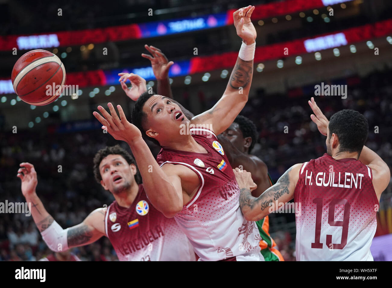 Beijing, China. 2nd Sep, 2019. Michael Carrera, Windi Graterol and Heissler Guillent (L to R) of Venezuela compete during the group A match between Venezuela and Cote d'Ivoire at the 2019 FIBA World Cup in Beijing, capital of China, on Sept. 2, 2019. Credit: Ju Huanzong/Xinhua/Alamy Live News Stock Photo