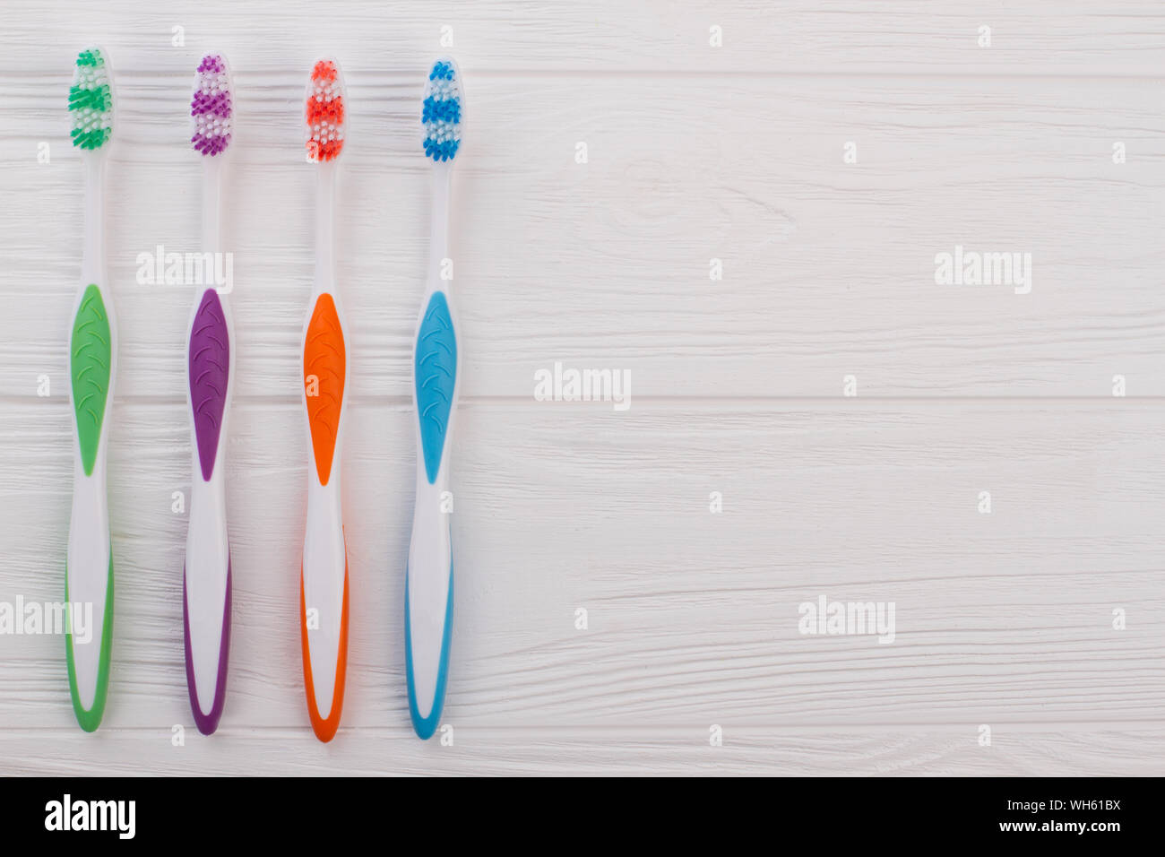 Set of tooth brushes and copy space Stock Photo Alamy