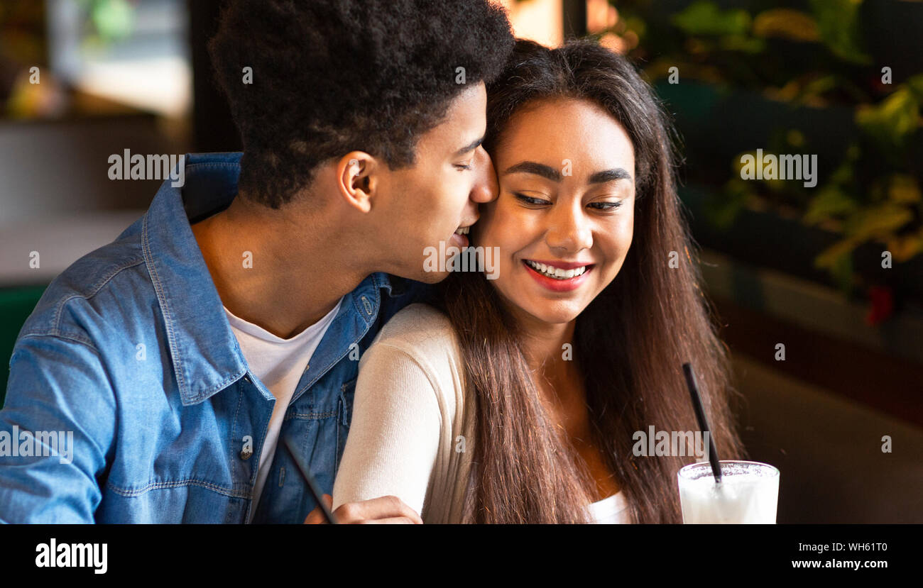 Teen couple cuddling hi-res stock photography and images - Alamy