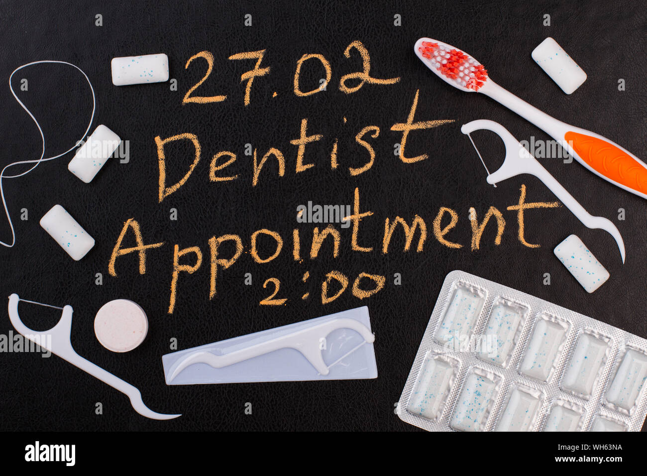 Dentist appointment reminder on chalkboard Stock Photo Alamy