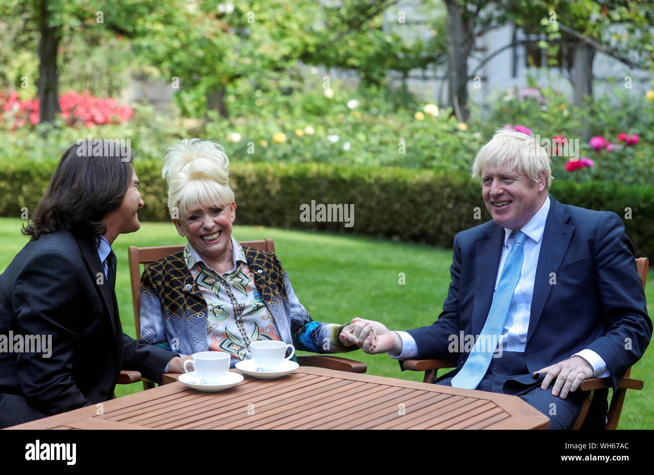 Dame Barbara Windsor and her husband Scott Mitchell meeting Prime Minister Boris Johnson after they delivered an Alzheimer's Society open letter to 10 Downing Street in Westminster, London, calling on him to address the 'devastating state' of dementia care. Stock Photo