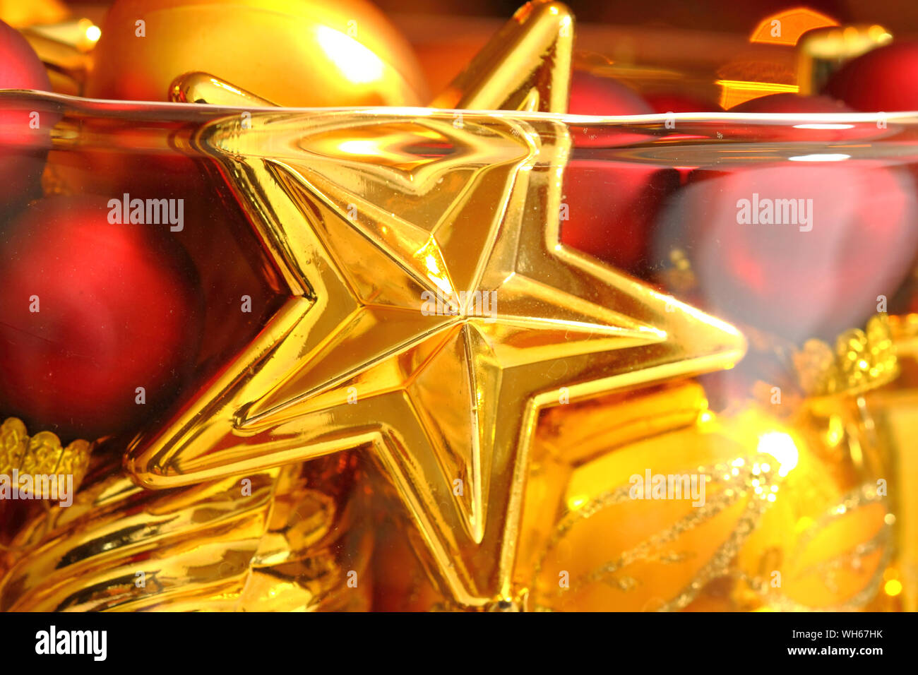 Christmas Redn And Gold Ornaments In Glass Vase Closeup Stock