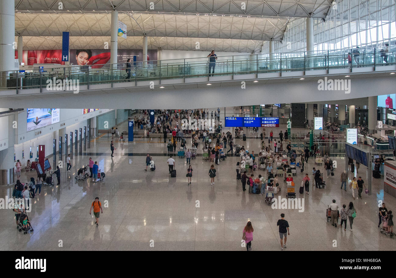 Departures hall of Hong Kong International Airport, one of the world's busiest. Mass demonstrations in August 2019 brought it to a standstill. Stock Photo