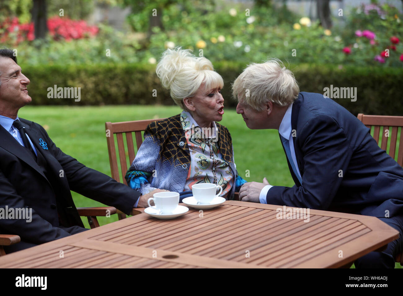 Dame Barbara Windsor and her husband Scott Mitchell meeting Prime Minister Boris Johnson after they delivered an Alzheimer's Society open letter to 10 Downing Street in Westminster, London, calling on him to address the 'devastating state' of dementia care. Stock Photo