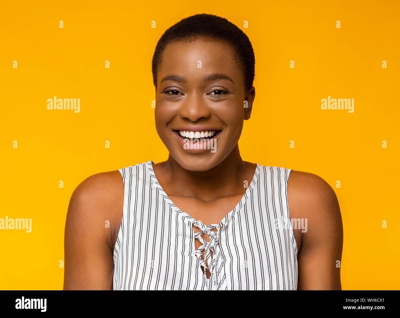 Black female studio laughing hi-res stock photography and images - Alamy