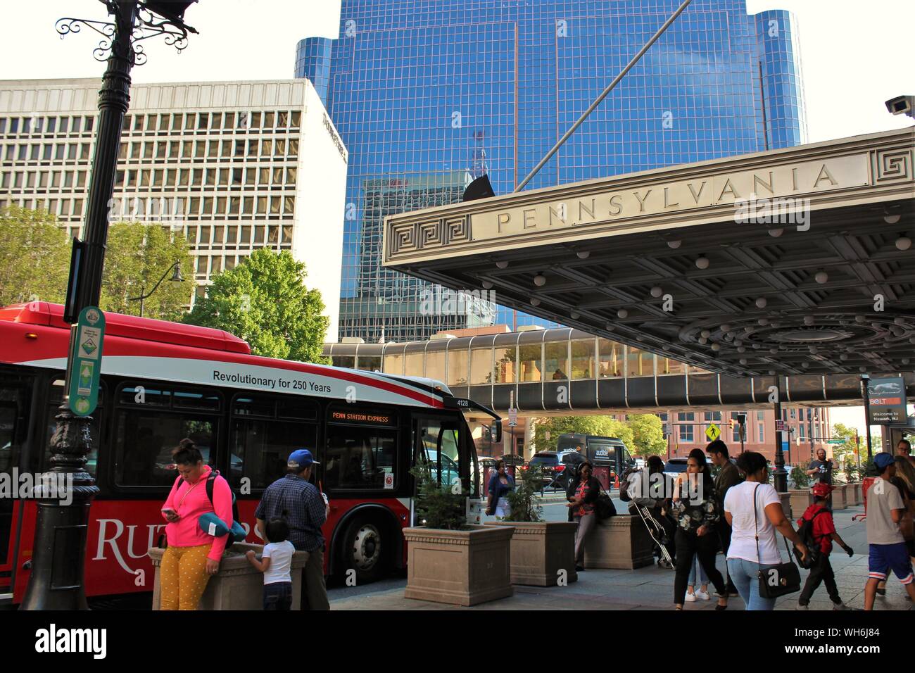 Newark, New Jersey - August 15th 2019: Authentic street view of the pedestrian entrance to the busy Pennsylvania rail and bus station, in Newark NJ. Stock Photo