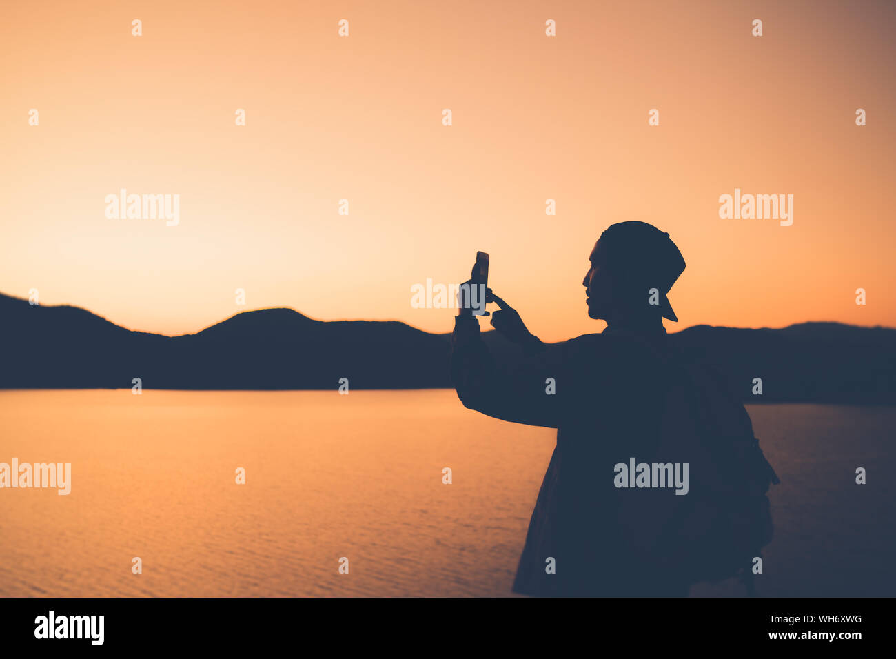 The Silhouette Of Man Sitting Alone At The Beach Concept Of Lonely Sad Alone Person Space Alone And Scared Stock Photo Alamy
