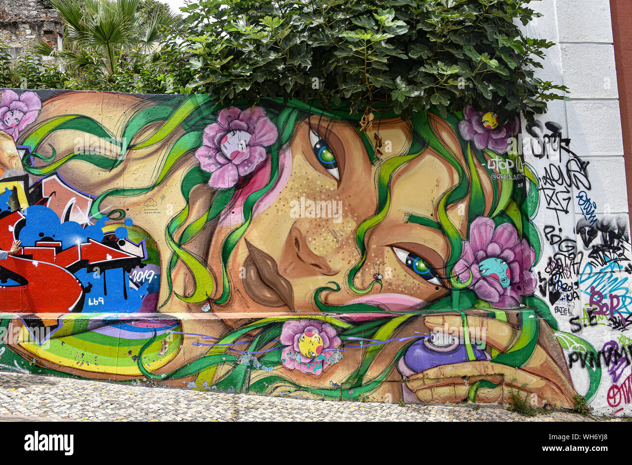 Lisbon, Portugal - July 27, 2019: Examples of colorful Graffiti art on the streets of Lisbon Stock Photo
