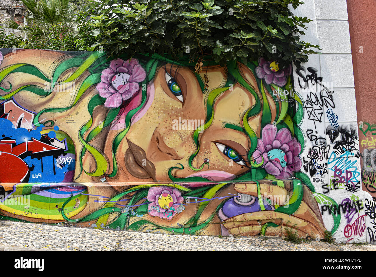Lisbon, Portugal - July 27, 2019: Examples of colorful Graffiti art on the streets of Lisbon Stock Photo