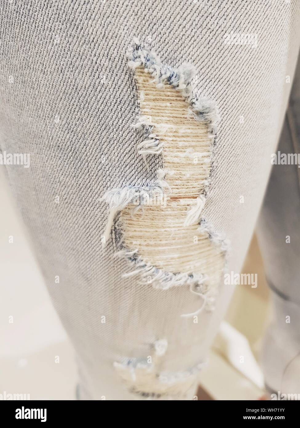 Torn Clothing High Resolution Stock Photography and Images Alamy