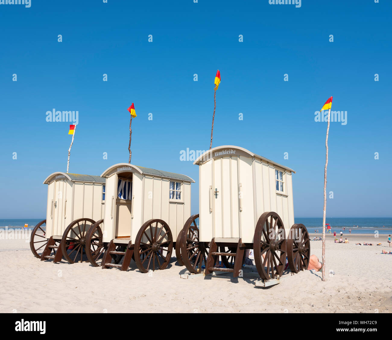 old fashioned bathing carts used for changing on sunny beach of german island norderney Stock Photo