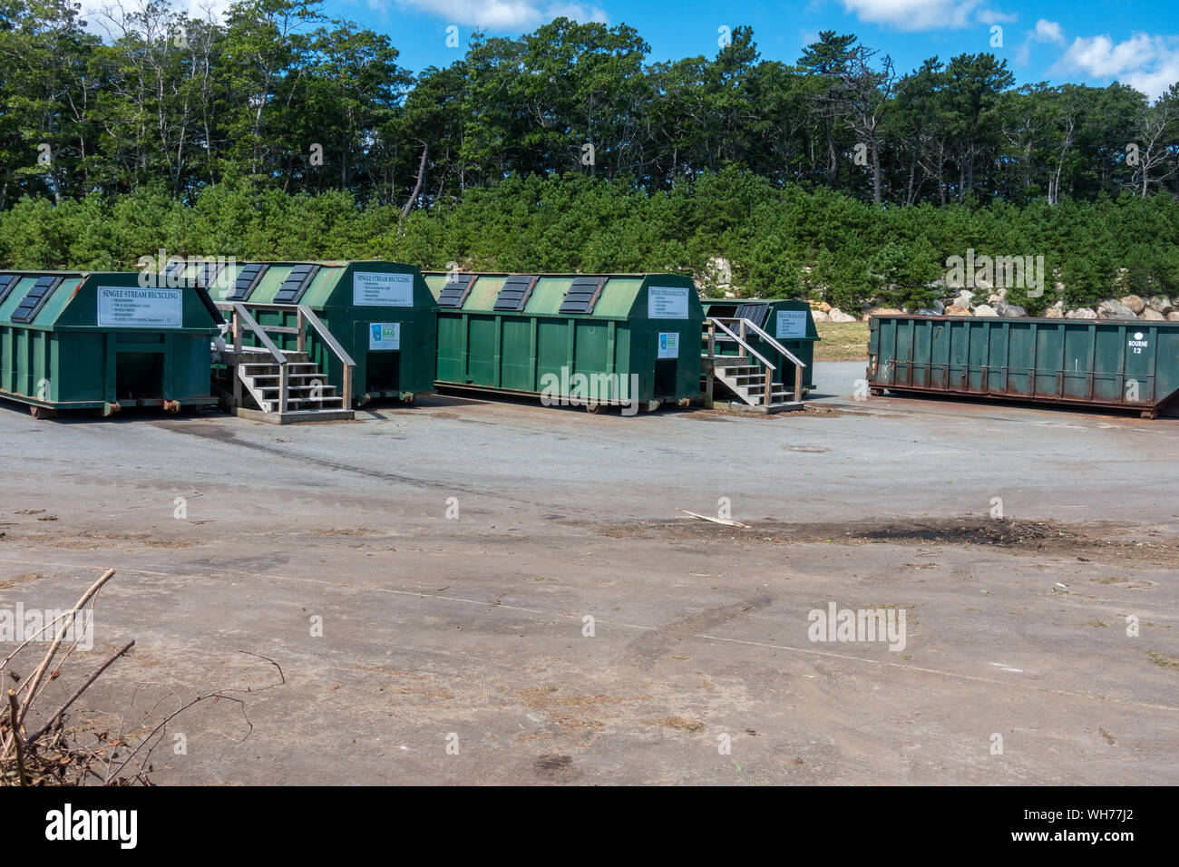 Single Stream recycling center containers for glass, plastic and paper at US landfill at the Bourne Integrated Solid Waste Management facility Stock Photo