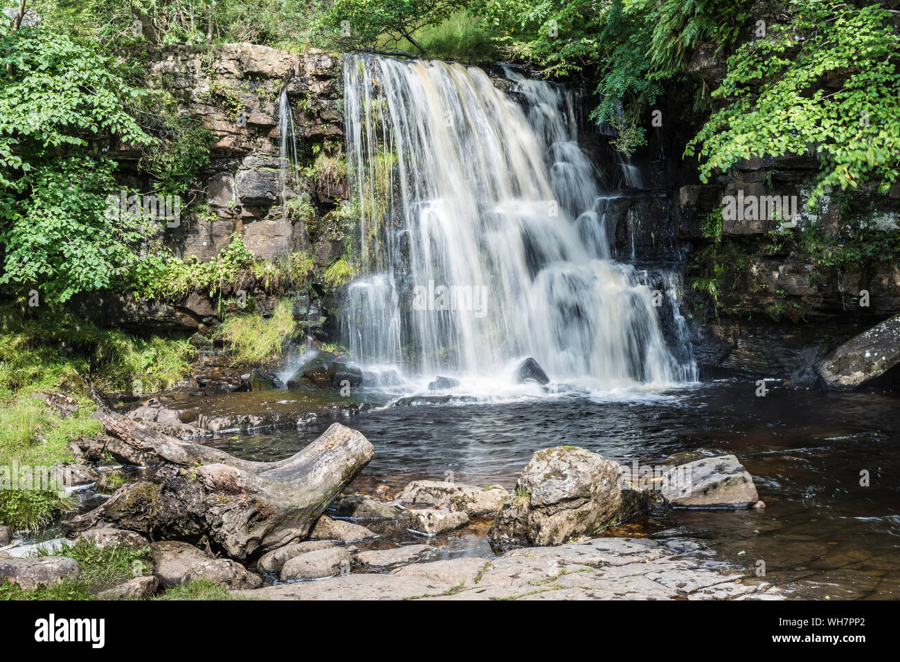 Catrake Force waterfall on the Coast to Coast scenic walk near the village of Keld in the Yorkshire Dales Stock Photo