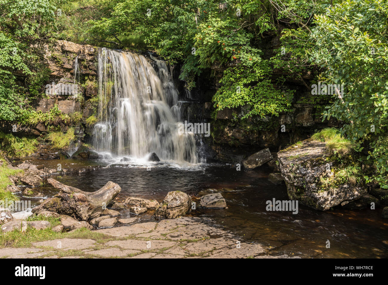 Catrake Force waterfall on the Coast to Coast scenic walk near the village of Keld in the Yorkshire Dales Stock Photo