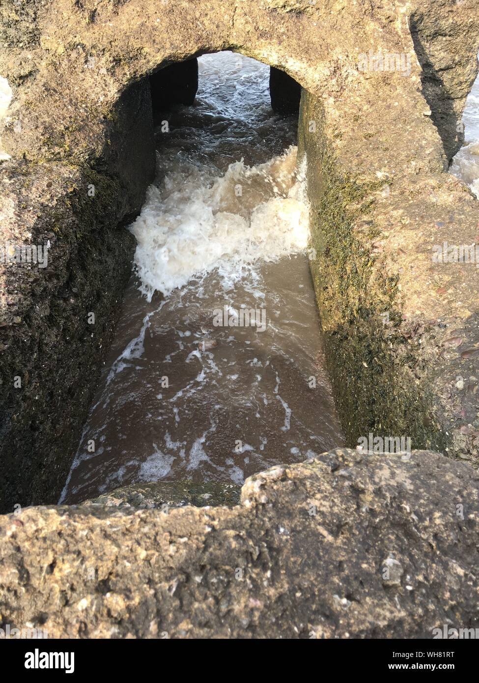 Water Flowing Through Rocks Stock Photo - Alamy