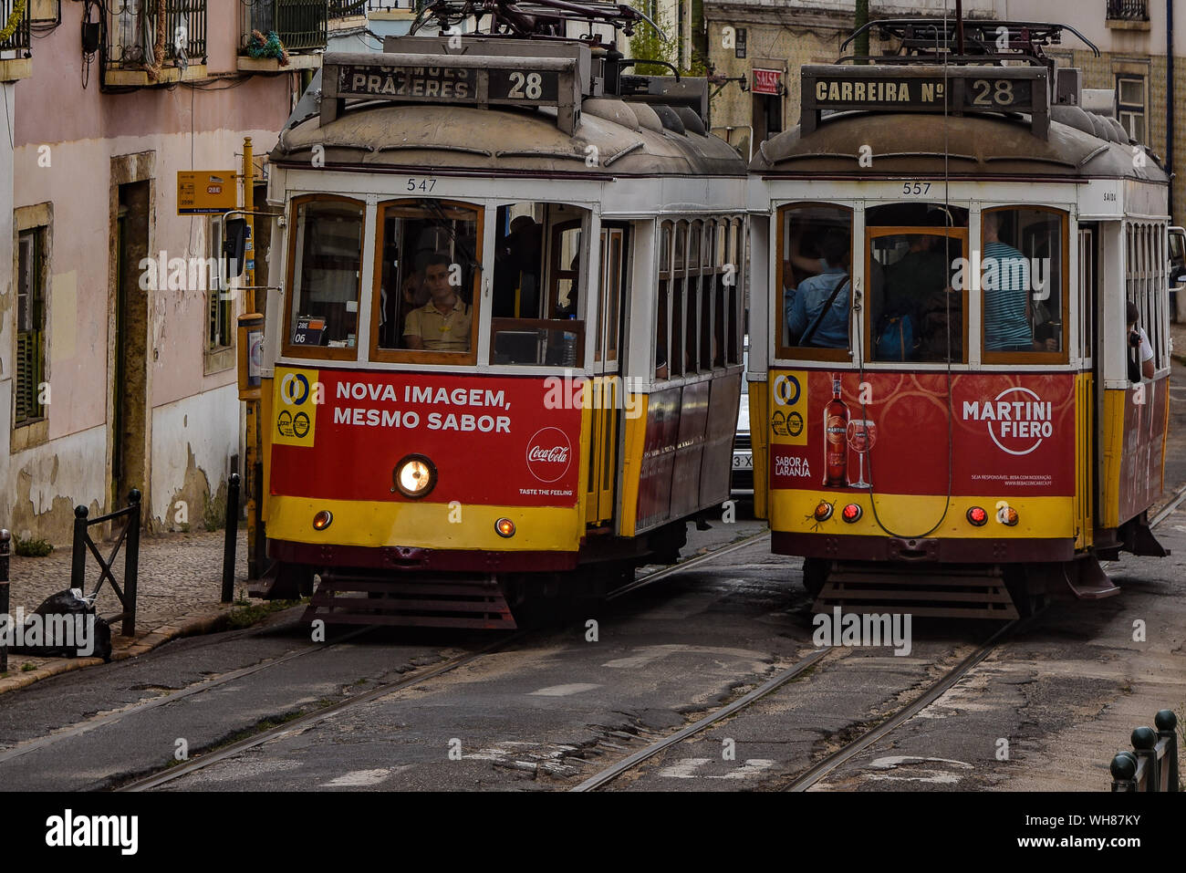 Lisbon, Portugal - July 27, 2019: Trams providing mass public transportation in the Alfama district of Lisbon, Portugal Stock Photo