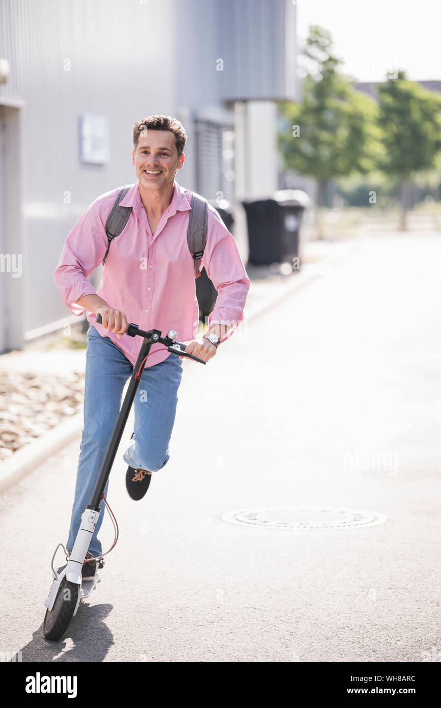Man riding e scooter germany hi-res stock photography and images - Alamy
