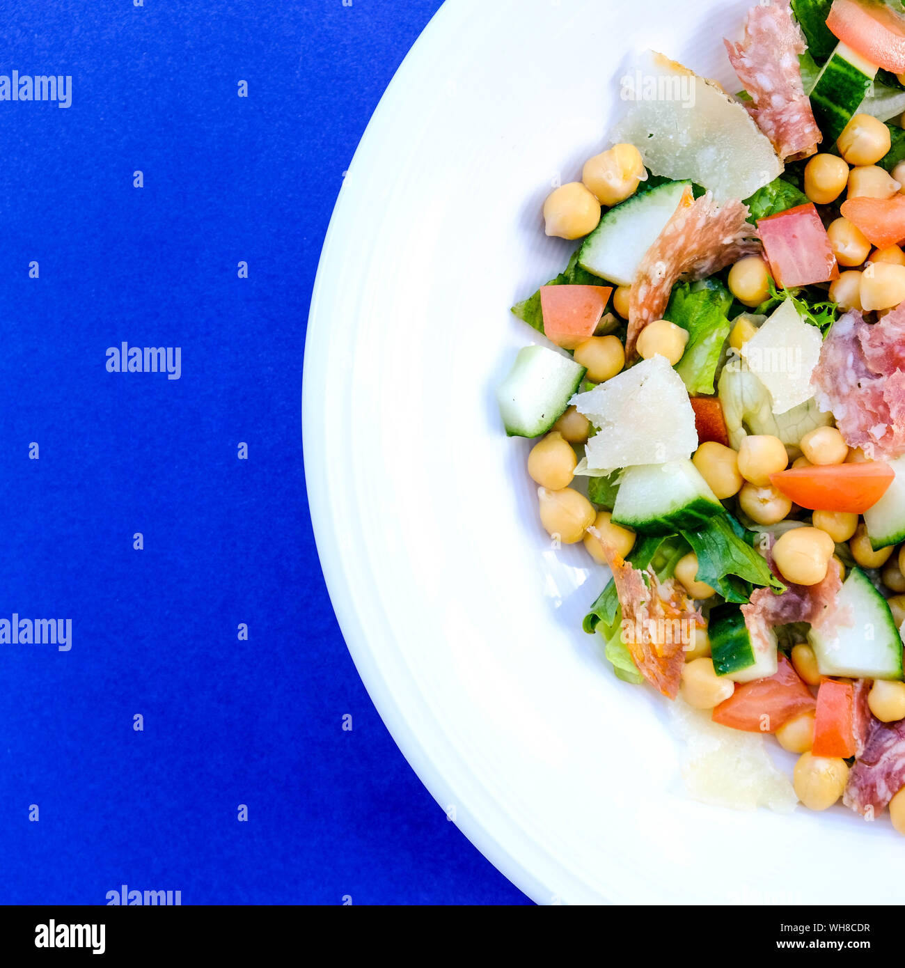 Fresh Healthy Salami Sausage Salad With Chickpeas, Tomatoes, Cucumber