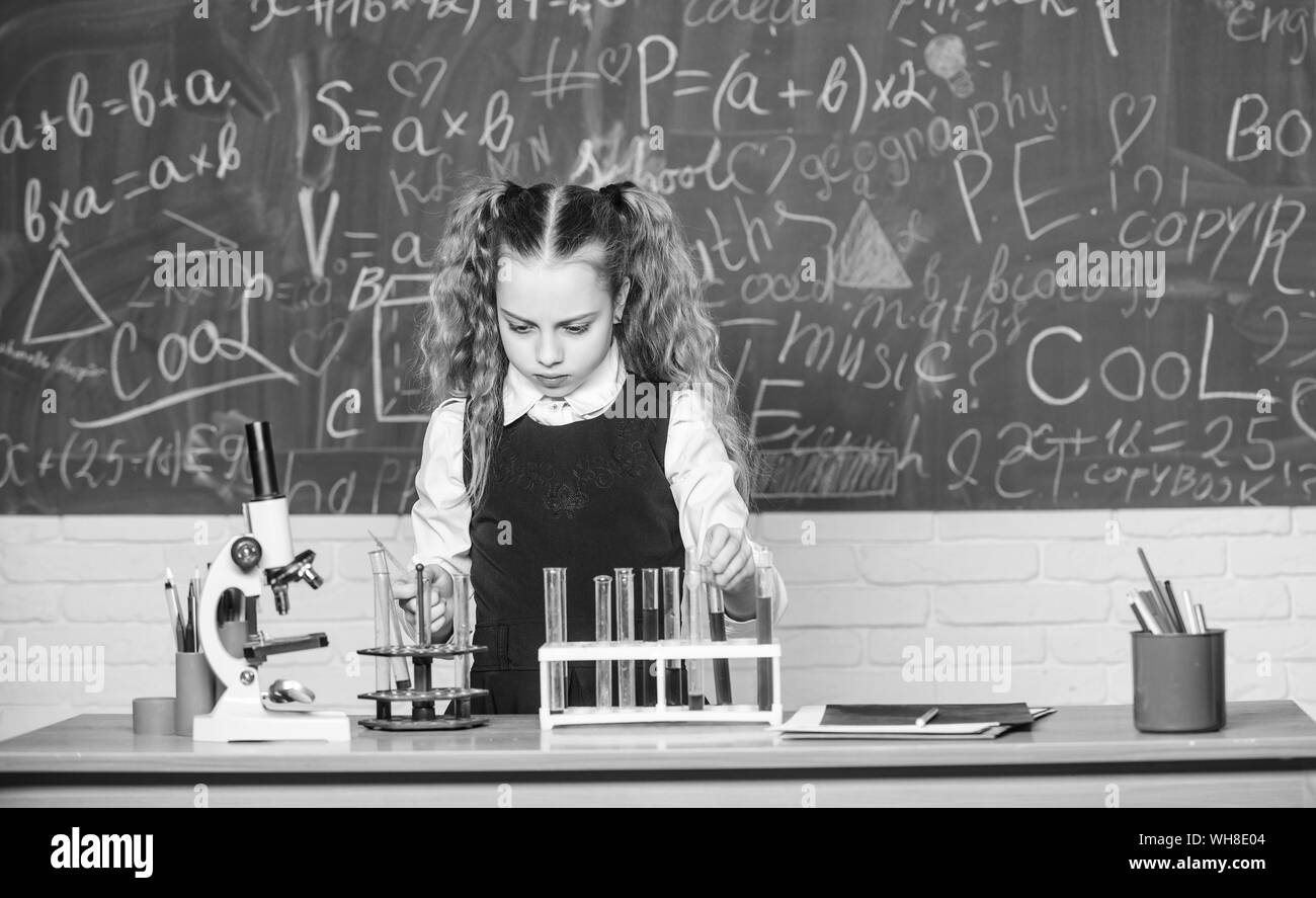 Biology equipment. biology education. Little kid learning chemistry in