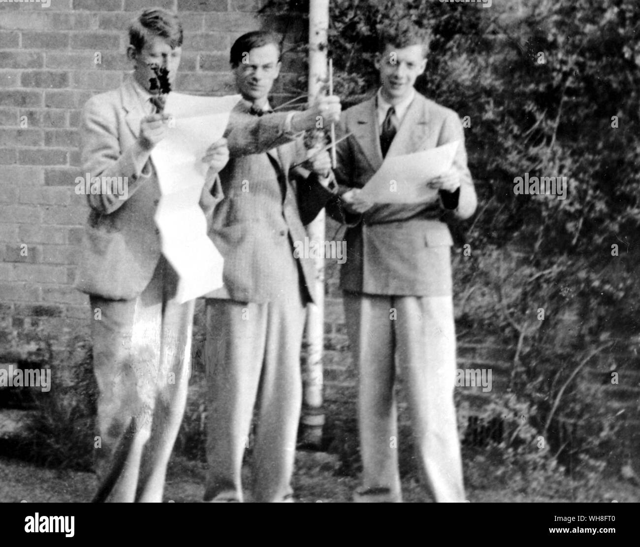 W H Auden (1907-1973) with William Coldstream (1908-1987) and Benjamin Britten (1913-1976) at the Downs School, Colwell, 1935. W H Auden, The Life of a Poet, by Charles Osborne.. . Stock Photo