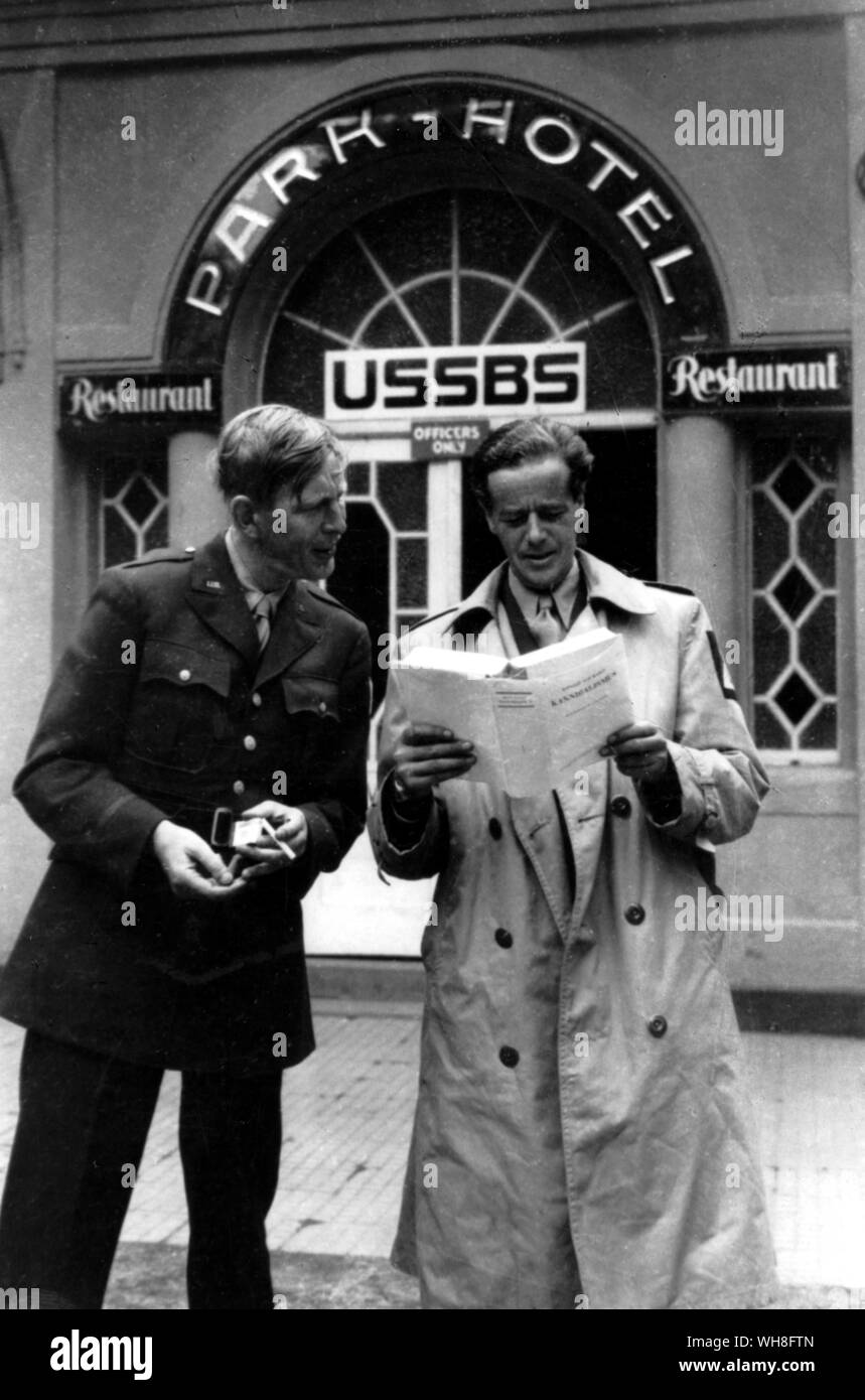 W H Auden with James Stern in Bad Nauheim, 1945, when they were both members of the United States Strategic Bombing Survey. Wystan Hugh Auden (1907-1973) was an English poet and critic, widely regarded as among the most influential and important writers of the 20th century. He spent the first part of his life in the United Kingdom, but emigrated to the United States in 1939, becoming a U.S. citizen in 1946. W H Auden, The Life of a Poet, by Charles Osborne.. . Stock Photo