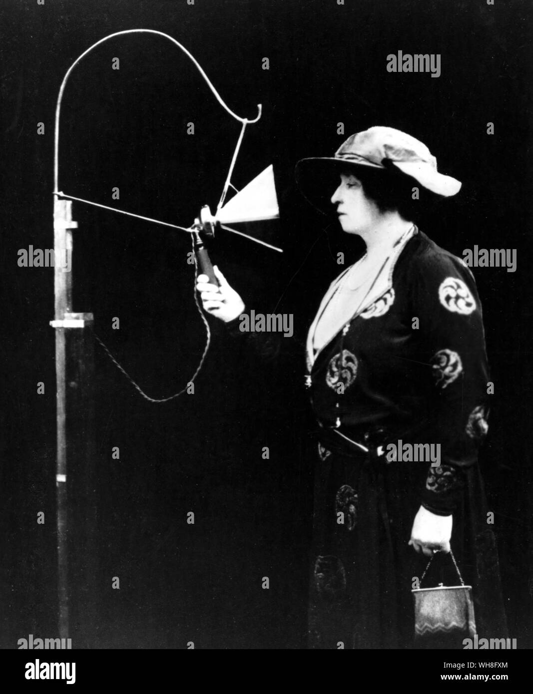 First Broadcast, Dame Nellie Melba, 19:10 on 15 June 1920, adopted name of Helen Porter Mitchell (1861-1931). Australian Soprano. She opened her recital by singing Home Sweet Home and after other popular favourites and encores, closed with the National Anthem. In the hastily adapted Marconi studio at the Chelmsford works, she used a microphone created with a telephone mouthpiece and wooden cigar-box.. . Stock Photo