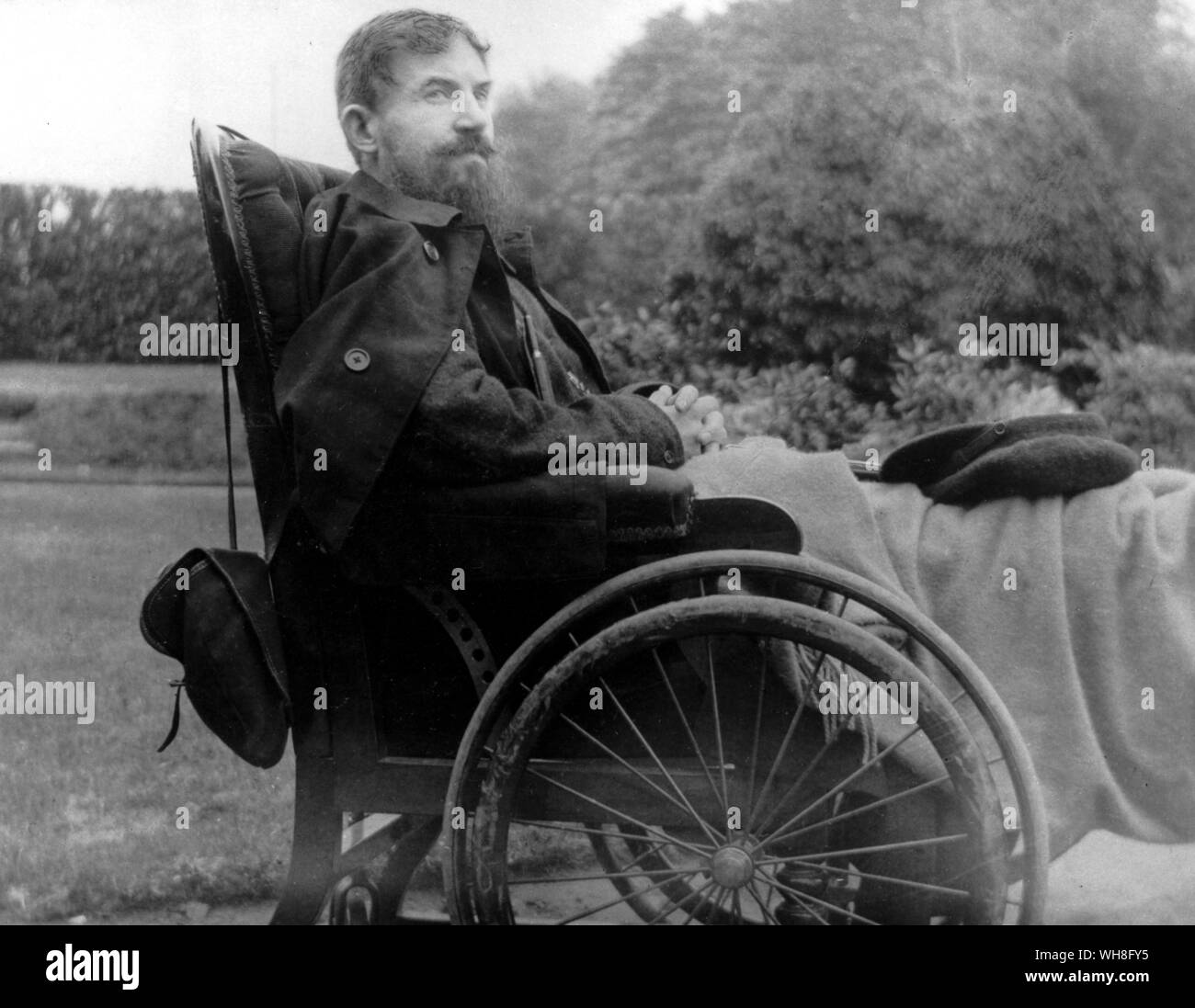 George Bernard Shaw, newly married and lame in his invalid chair. George Bernard Shaw (1856-1950) was an Irish playwright and winner of the Nobel Prize for Literature in 1925. The Genius of Shaw page 104. Stock Photo