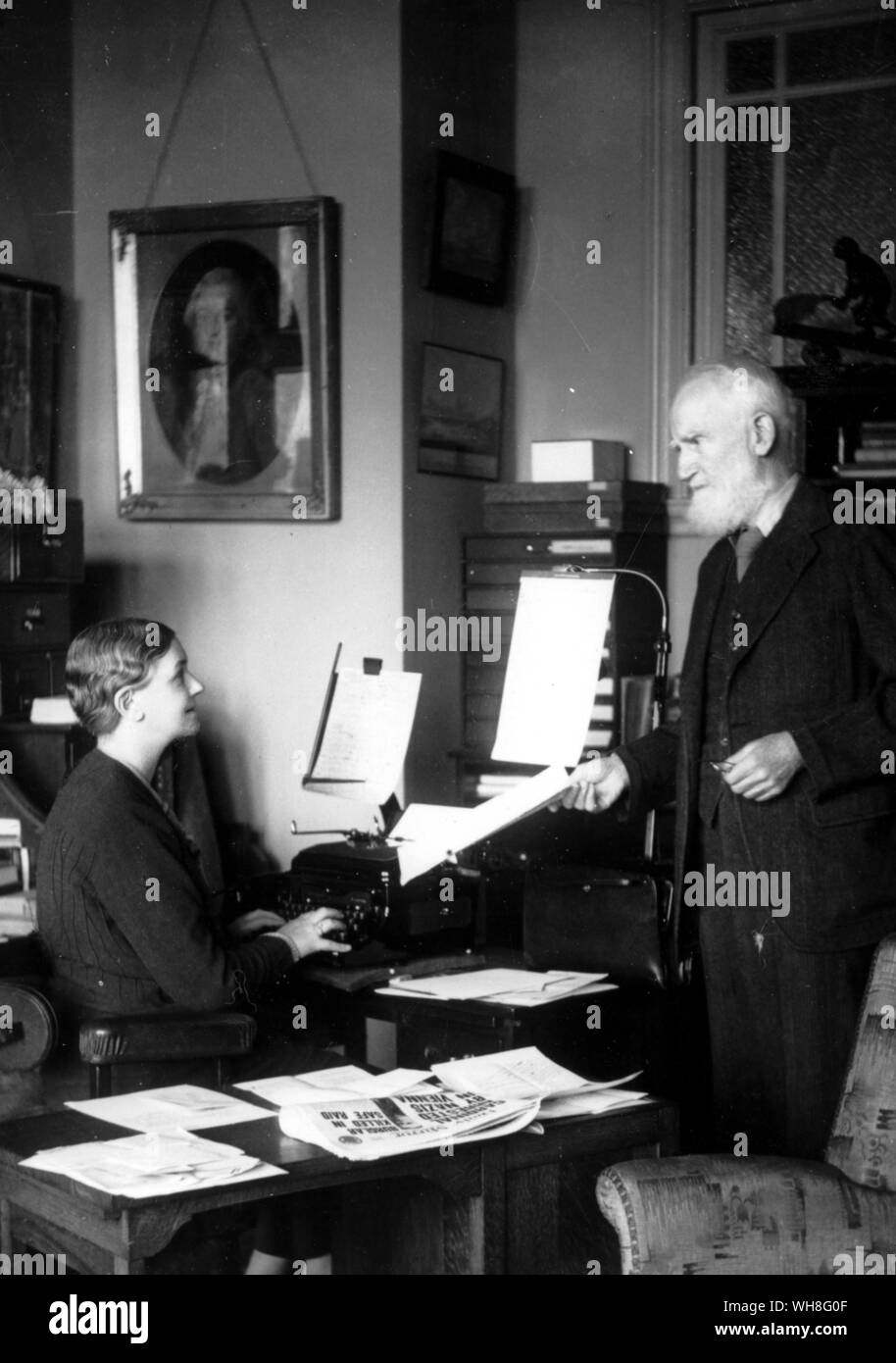 George Bernard Shaw with his secretary, Blanche Patch. Shaw (1856-1950) was an Irish playwright and winner of the Nobel Prize for Literature in 1925. The Genius of Shaw page 216. Stock Photo