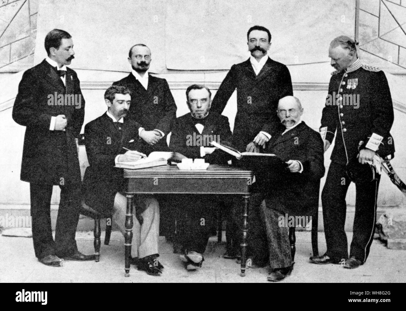 Some of the IOC members present at the 1896 Olympic Games, first meeting of the International Olympic Organizing Committee. They are, seated left to right, Baron Pierre de Coubertin (France), President Dimitros Vikelas (Greece) and Aleksei Botovsky (USSR). Standing left to right, Dr Willabald Gebhardt (Germany), Jiri Guthjarkovsky (Czechoslovakia), Francois Kemery (Hungary) and General Viktor Balck (Sweden). The Olympic Games page 23. Stock Photo