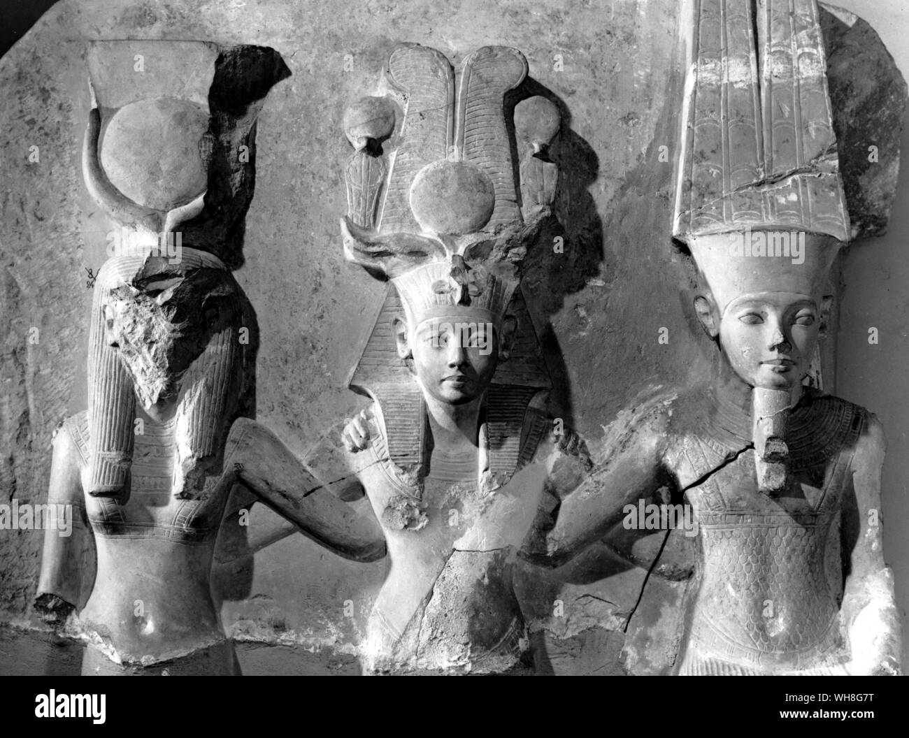 The trio composed of Amun, Mut and Tutankhamen who appears here as the divine son. Tutankhamen by Christiane Desroches Noblecourt, page 191.. Stock Photo