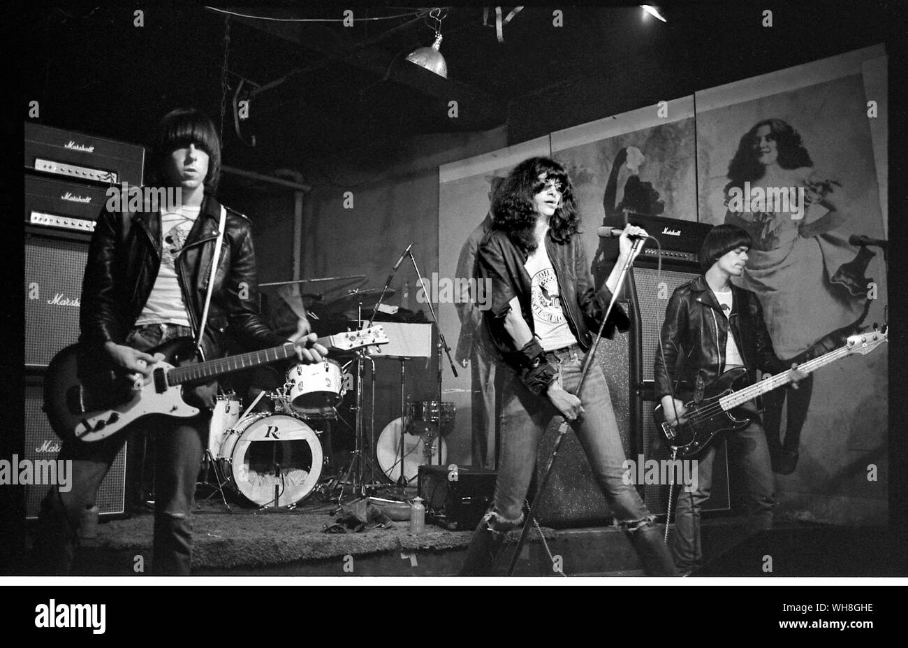 The Ramones: Johnny, Joey and Dee Dee Ramone onstage at CBGB,  February 1977 Stock Photo