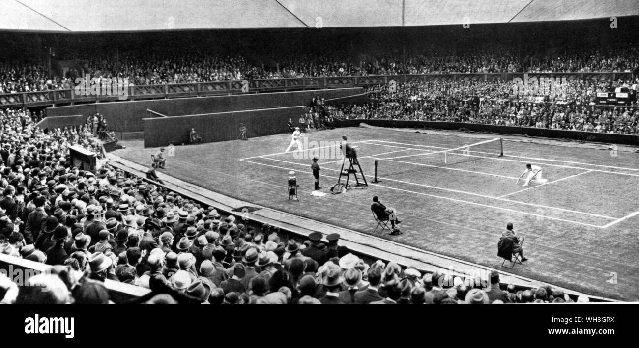 The Centre Court at the New Wimbledon, 1925, showing Rene Lacoste (left) and Jean Borotra (with beret). The Encyclopedia of Tennis page 33. Stock Photo