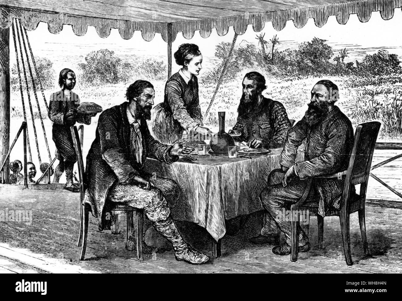 Tea at Gondokoro - Speke and Grant are entertained by the Bakers. John Hanning Speke (1827-1864) was an officer in the British Indian army, who made three voyages of exploration to Africa. James Augustus Grant, (1827-1892) was a Scottish explorer of eastern equatorial Africa. In 1860, Grant joined Speke in the memorable expedition which solved the problem of the Nile sources. The African Adventure - A History of Africa's Explorers by Timothy Severin, page 231. . Stock Photo