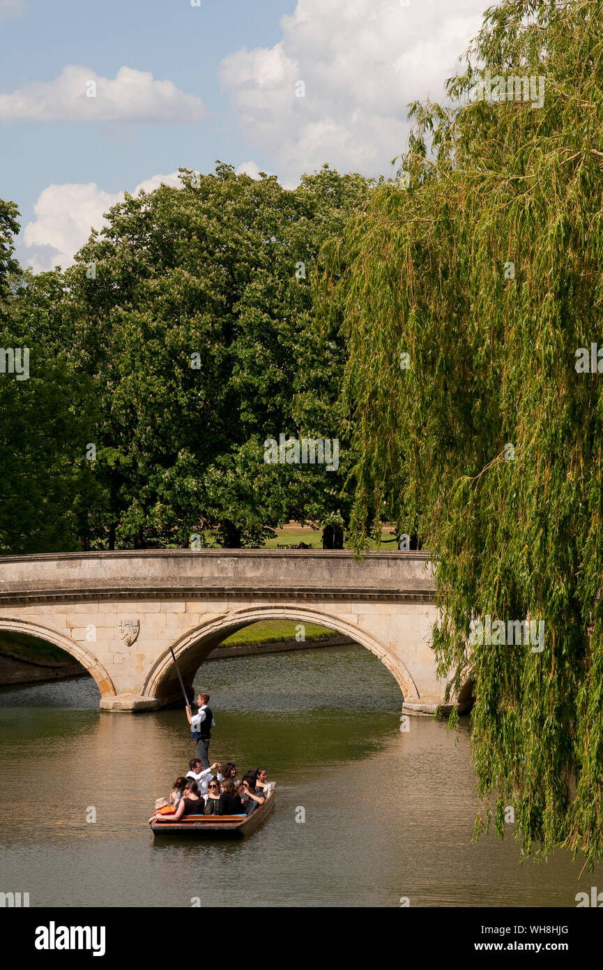 Tourists bring chauffered on a punt on the River Cam in Cambridge, England. Stock Photo
