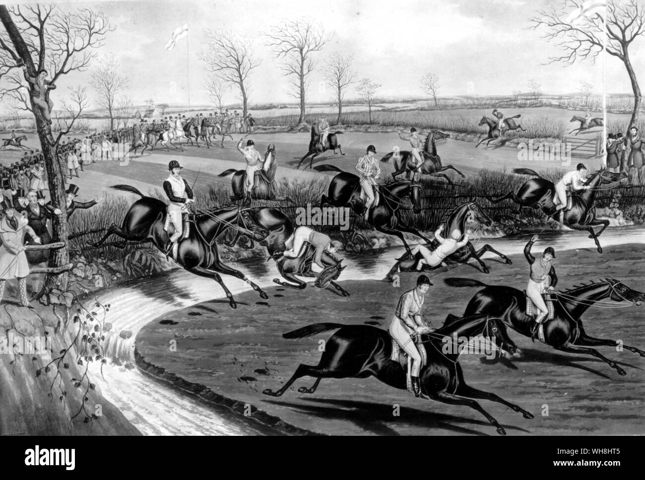 Liverpool Grand Steeplechase - This, in 1839, was the fourth Grand Steeplechase on the Aintree Course, but it is considered the first Grand National. They ran tiwce round a two-mile circuit, jumping 29 obstacles. Part of the course was plough. There were two brooks, each taken twice. The favourite was The Nun, Allen McDonough (stripes), the winner Lottery, Jem Mason (white blaze, behind him), and the second Seventy Four, Tom Oliver (extrme left, jumping). Captain Becher on Conrad had already fallen into the other brook for the second time. The History of Horse Racing by Roger Longrigg, page Stock Photo