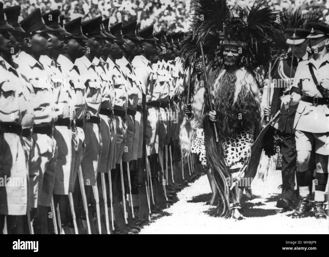 King Sobuza II wearing traditional national dress inspects members of the 1st Battalion Malawi rifles during the Swaziland Independence Celebrations in Mabane the Capital 6 September 1968 Stock Photo