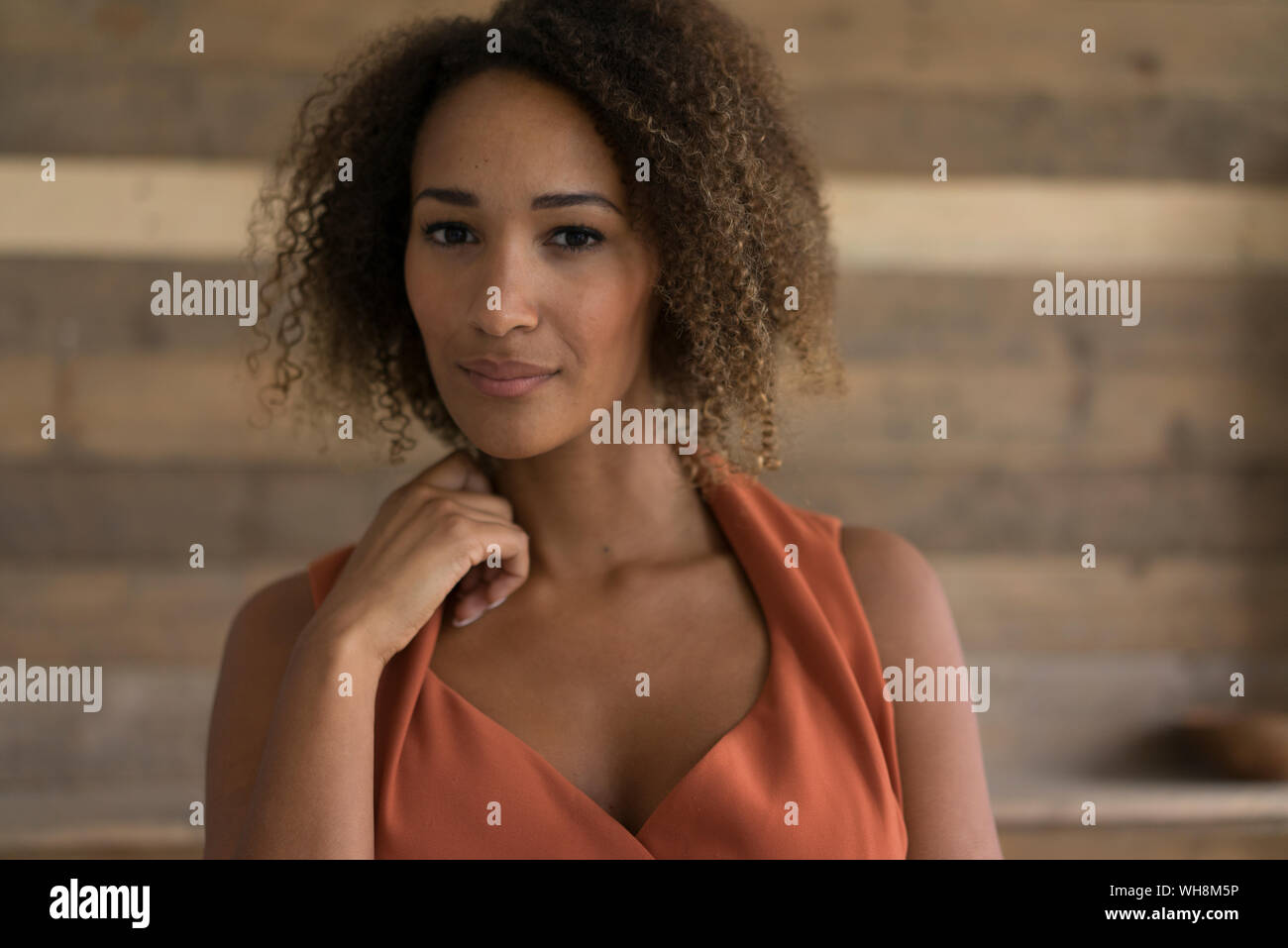 Portrait of young woman with ringlets Stock Photo