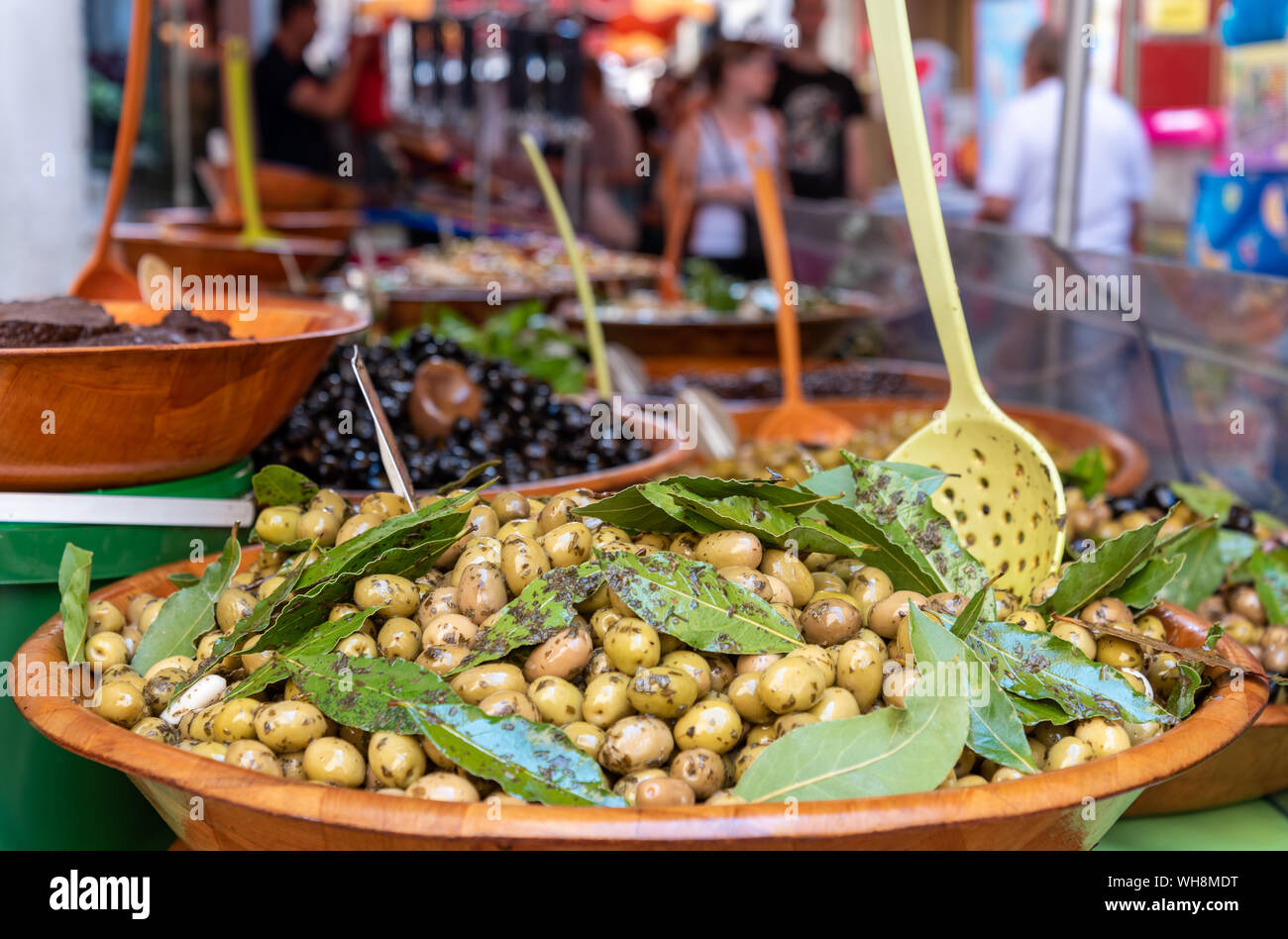 Olives in bowl for sale at a stall street market in Provence France