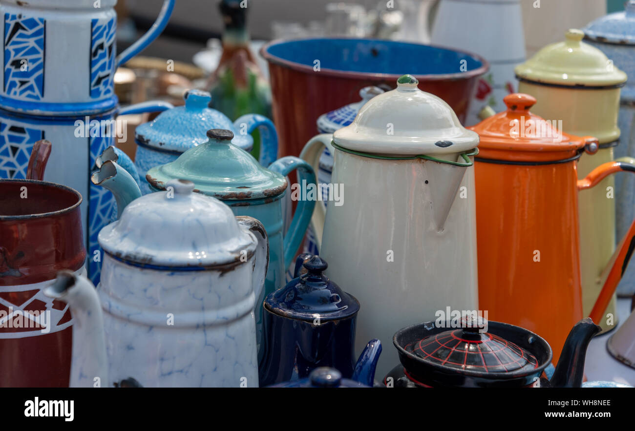 Water jugs on flea market Provence France Stock Photo