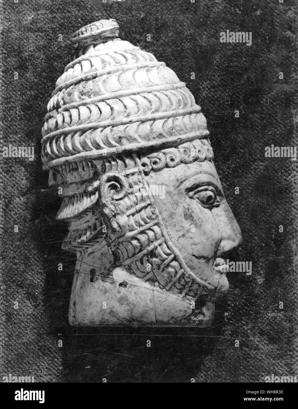 Achaecan warrior in boar's-tusk helmet.  Ivory.  Froma chamber tomb at Mycenae, 14th century Stock Photo